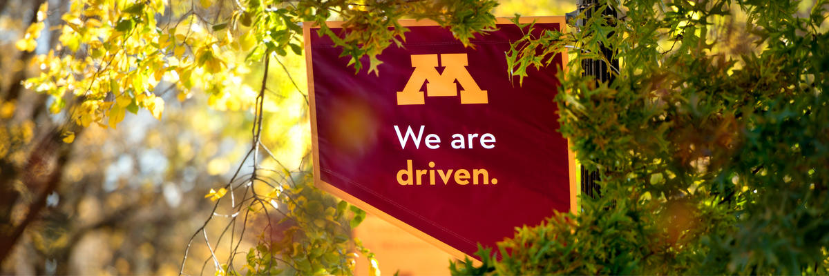 Image of a banner with the Block M that reads "We are driven"